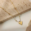 Golden Heart pendant with doted chain