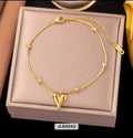 GOLDEN HEART BRACELET WITH DOTED CHAIN