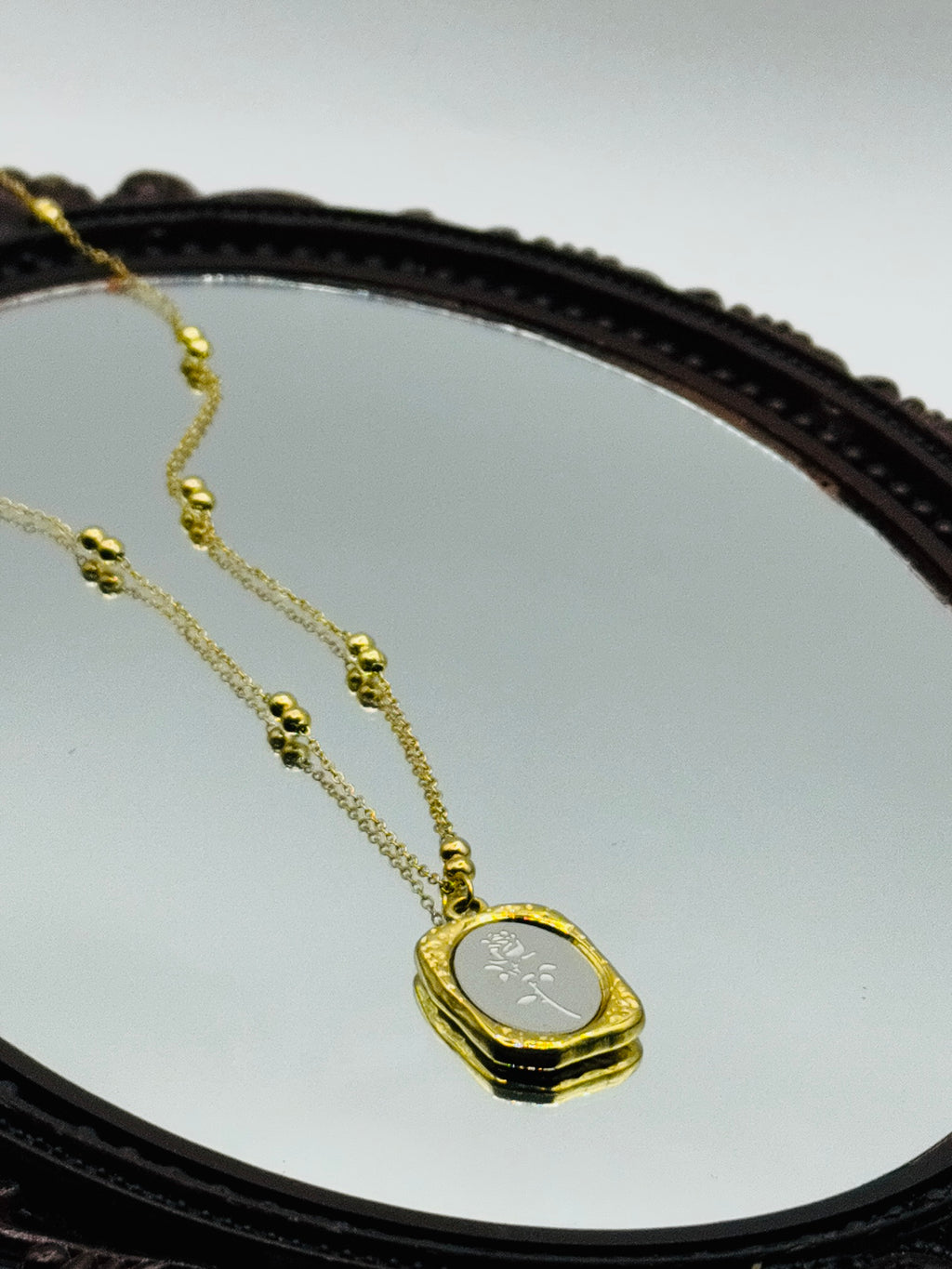 Gold and Silver whisper Pendant