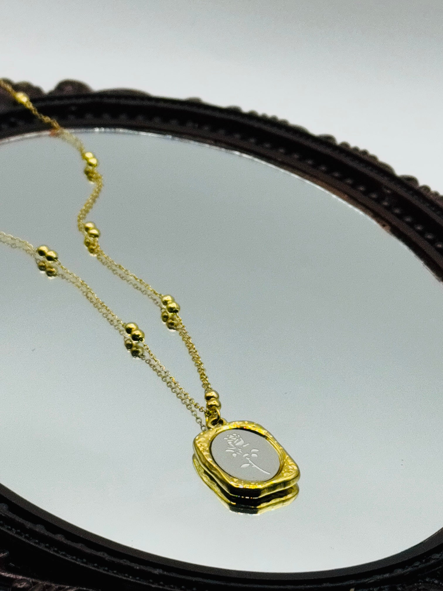 Gold and Silver whisper Pendant