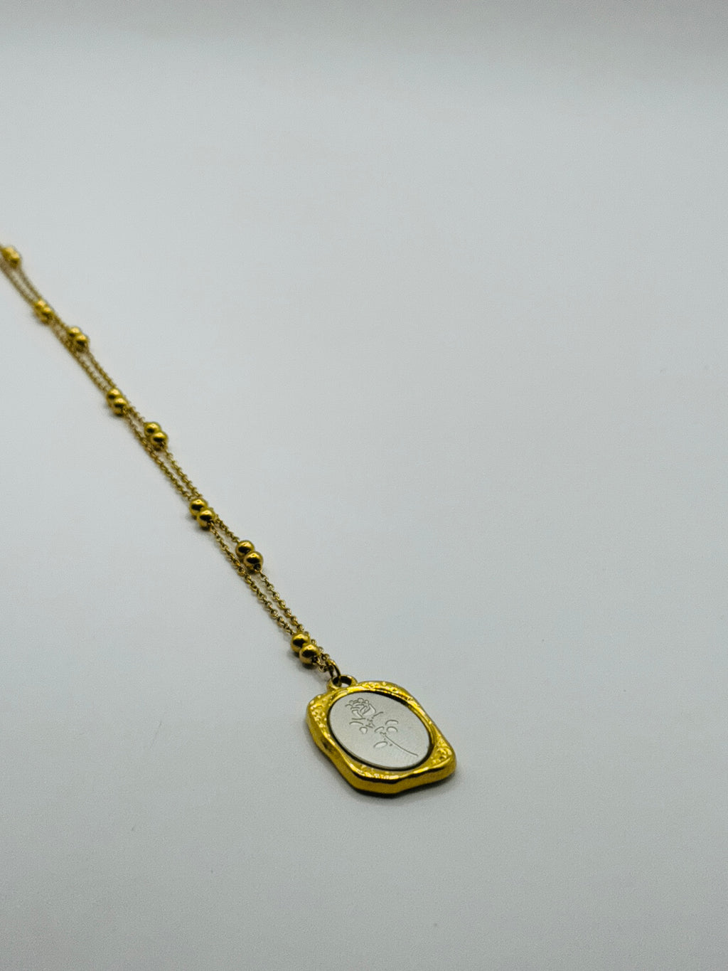 Gold and Silver whisper Pendant