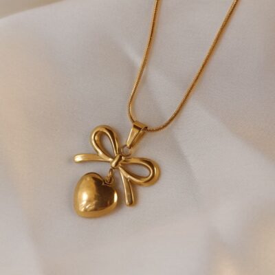 BOWTIE WITH HEART PENDANT