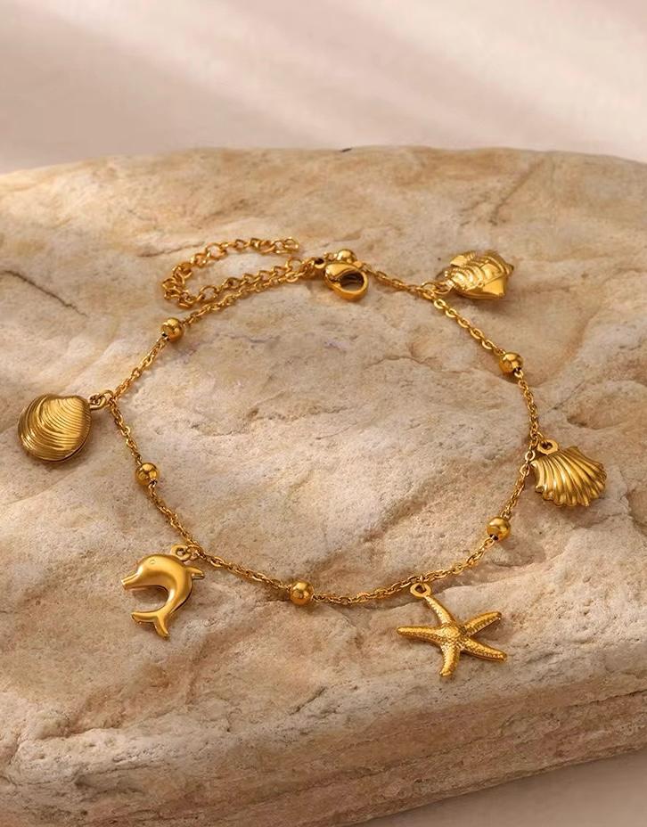 Gold Ocean Charm Bracelet - Dolphin Starfish Shell