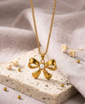 Pearl Centre Gold Bow Pendant Necklace