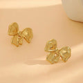 Chunky Gold Bow Stud Earrings - Lifestyle