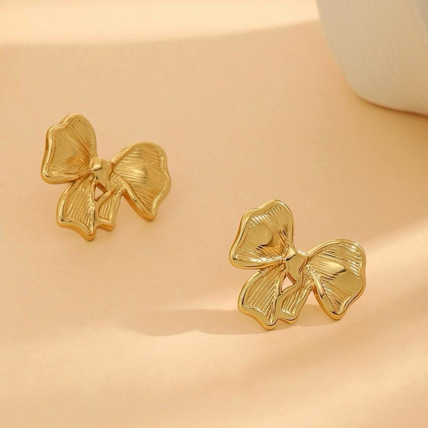 Chunky Gold Bow Stud Earrings - Lifestyle